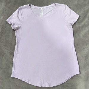 Light purple lululemon t-shirt.